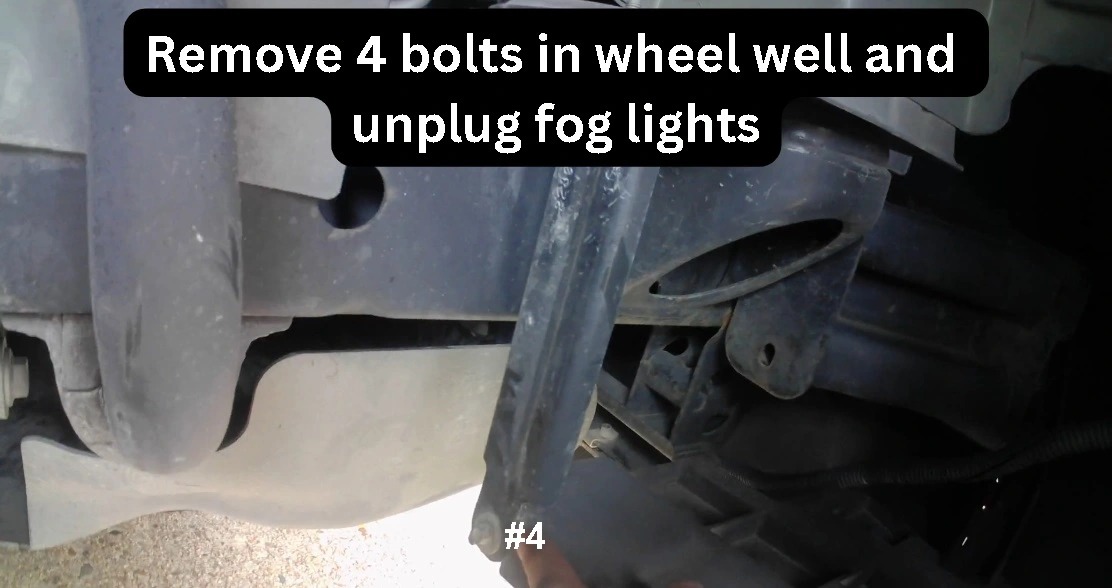 Remove 4th bolt in wheel well